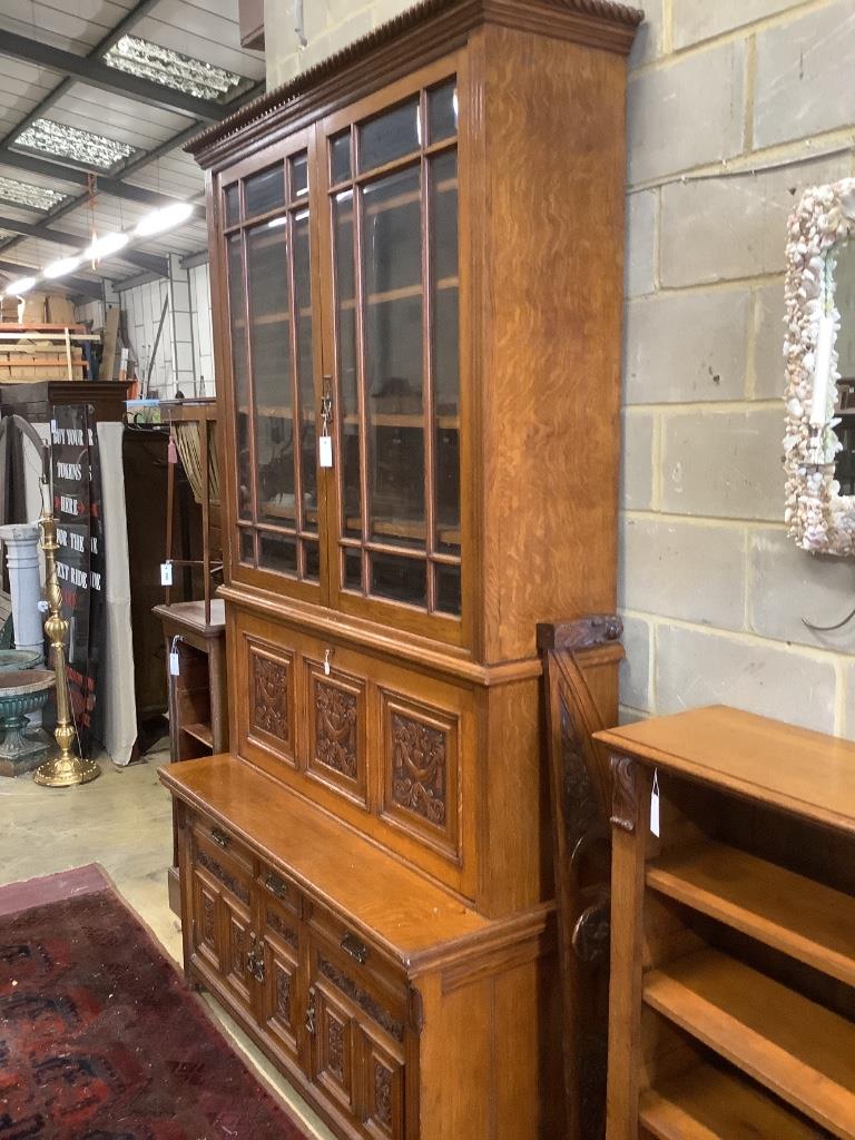 A large Victorian oak secretaire bookcase, width 144cm, depth 61cm, height 290cm, believed to originate from the Hull area having belonged to a member of the Strachan family